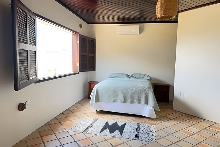 House with a pool and barbecue area in Tibau do Sul.