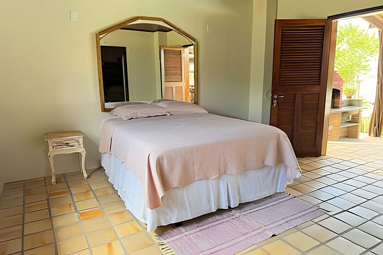 House with a pool and barbecue area in Tibau do Sul.