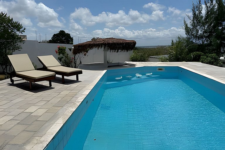 House with a pool and barbecue area in Tibau do Sul.