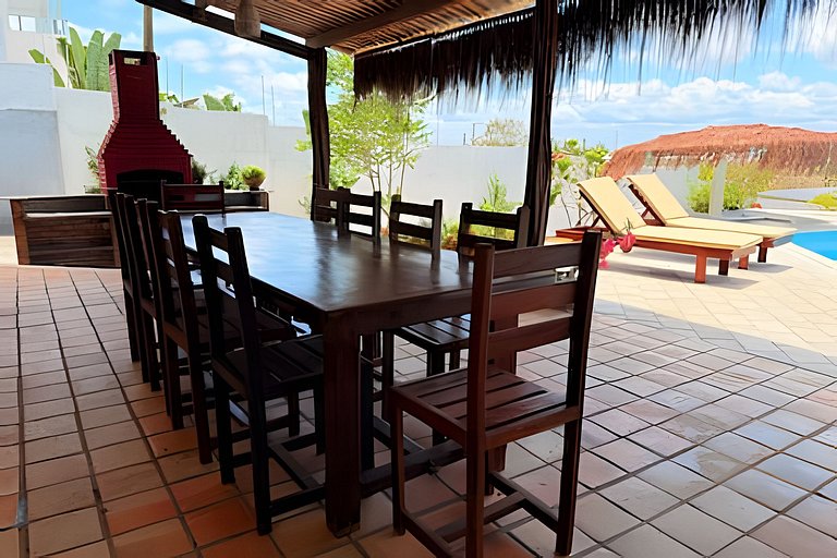 House with a pool and barbecue area in Tibau do Sul.