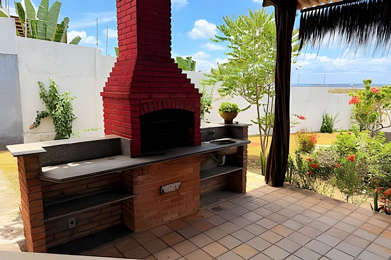House with a pool and barbecue area in Tibau do Sul.
