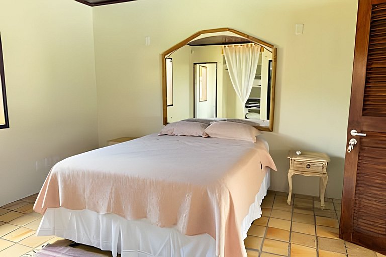 House with a pool and barbecue area in Tibau do Sul.