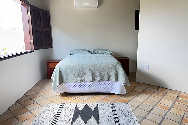 House with a pool and barbecue area in Tibau do Sul.