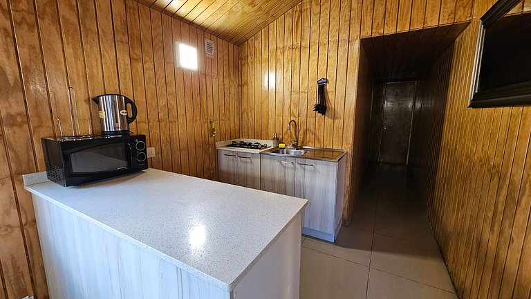 Cabin with green areas, steps from the sea, Curanipe.