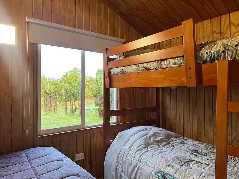 Cabin with green areas, steps from the sea, Curanipe.