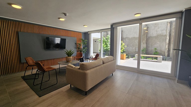 Departamento con A/C a minutos de Movistar Arena.