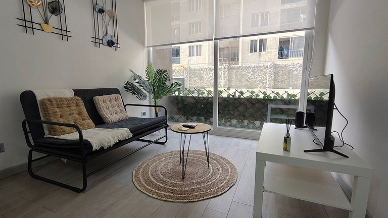 Apartment steps from Metro La Cisterna.