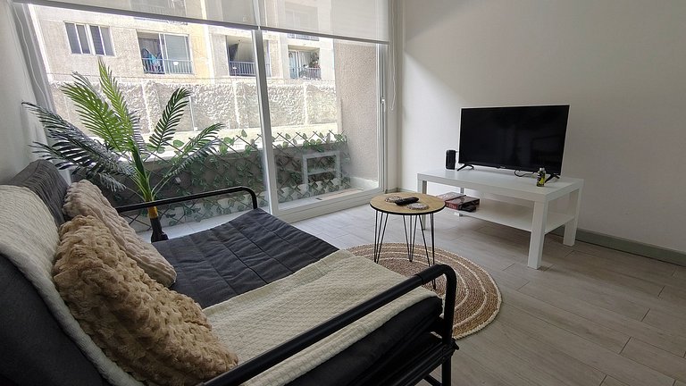 Apartment steps from Metro La Cisterna.