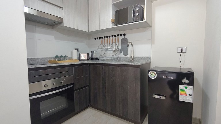 Apartamento a poucos passos do Metrô La Cisterna,