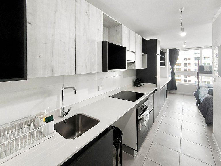 Apartamento a poucos passos do Farol Monumental