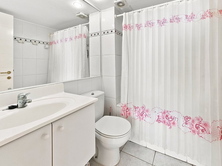 Apartamento familiar em frente à Praia Cochoa